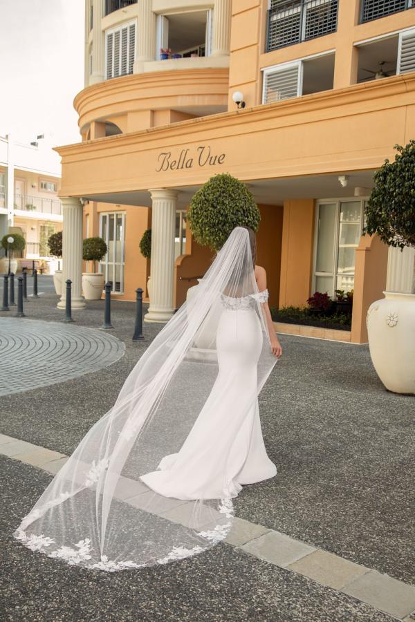 ELORA-MAE-ML19600-SOFT-SCOOP-NECKLINE-FLORAL-LACE-BODICE-GOWN-WITH-FITTED-CREPE-SKIRT-AND-DETACHABLE-OFF-SHOULDER-STRAPS-MATCHING-VEIL-WEDDING-DRESS-MADI-LANE-BRIDAL6