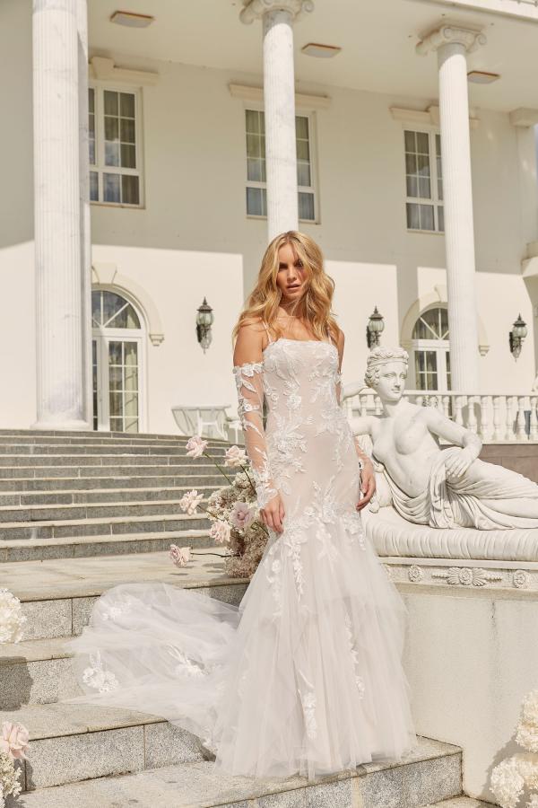 DELLA ML22179 FULL LENGTH FIT AND FLARE GOWN WITH STRAIGHT NECKLINE THIN STRAPS DETACHABLE SLEEVES ILLUSION BACK BODICE WITH BUTTONS AND ZIPPER CLOSURE WEDDING DRESS MADI LANE BRIDAL 1